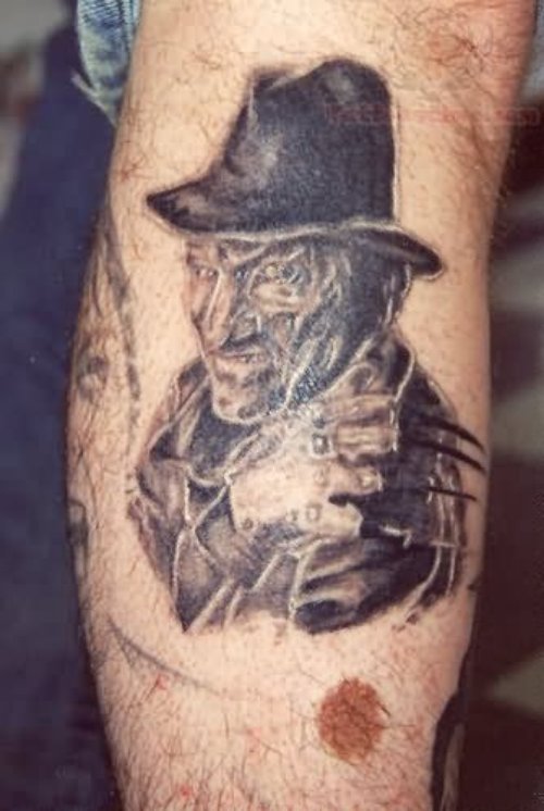 Grey Ink Freddy Krueger Tattoo On Back Leg